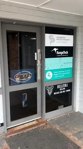 The shared street entrance at 375 Cross Rd, Edwardstown, with the Saunders Physiotherapy sign on the door