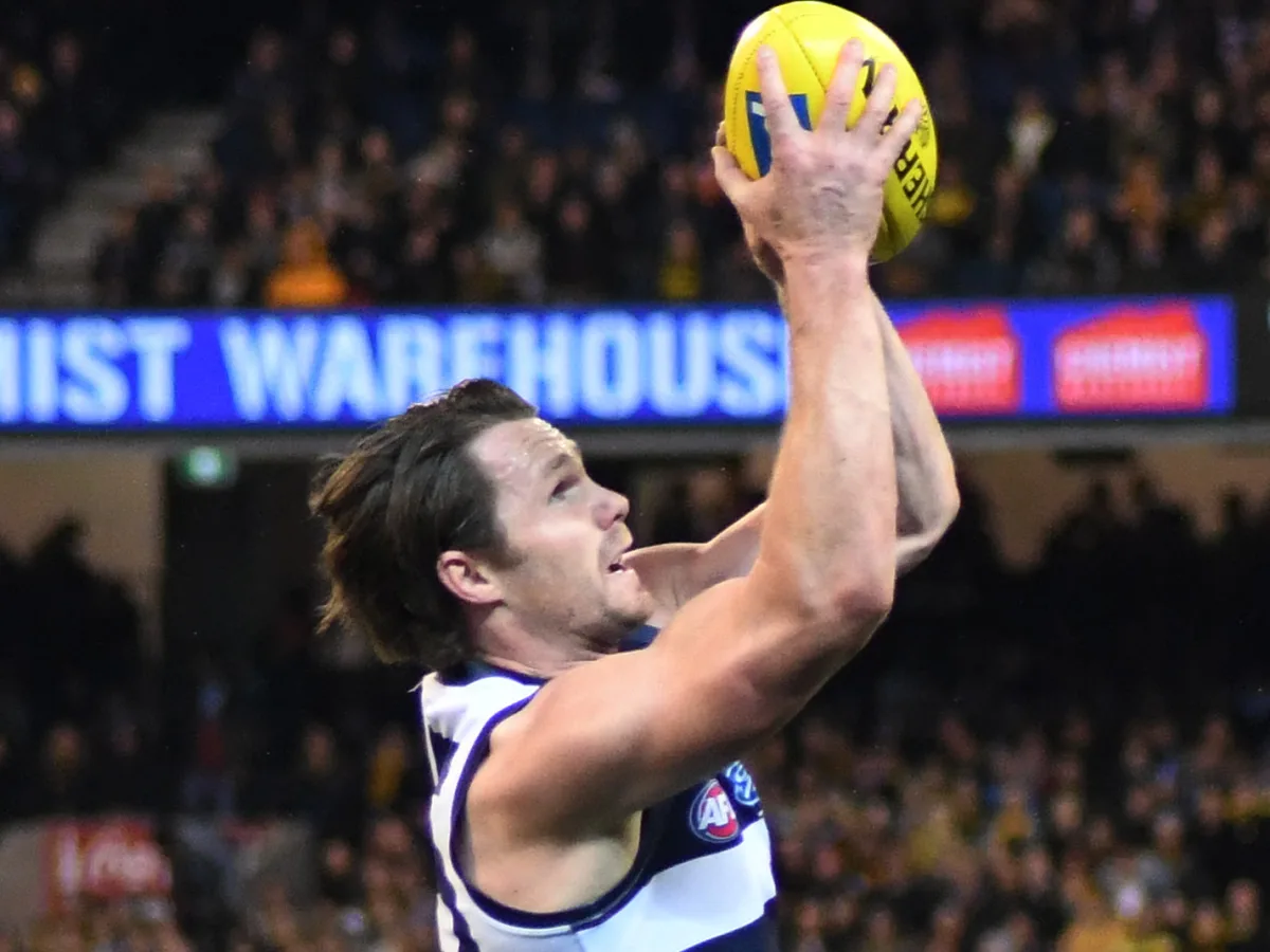 Patrick Dangerfield of Geelong rises to take a mark against Richmond at the MCG, August 2018