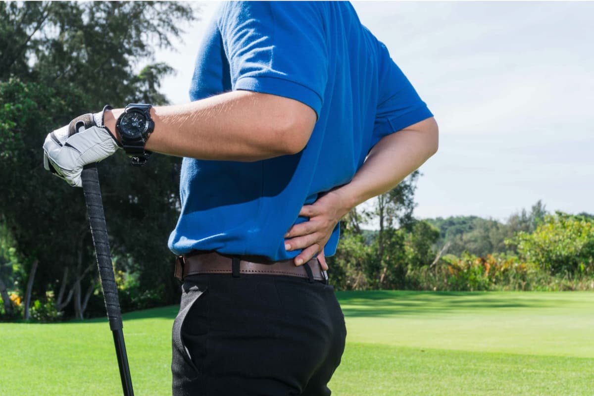 Golfer with low back pain after swing